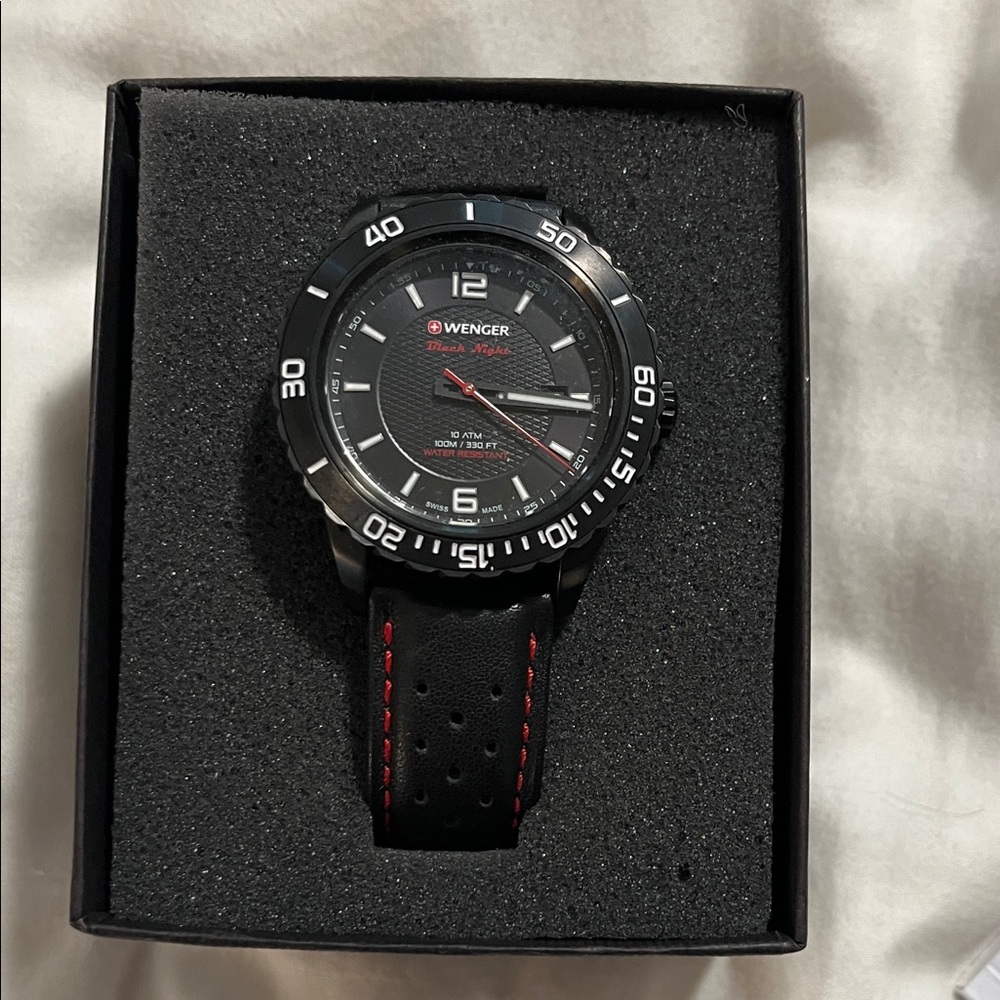 Wenger Black and Red Men's Watch. Hardly worn! Will need a battery. Black Bezel